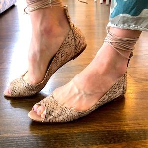 Ankle wrapped snake skin peep toe shoes